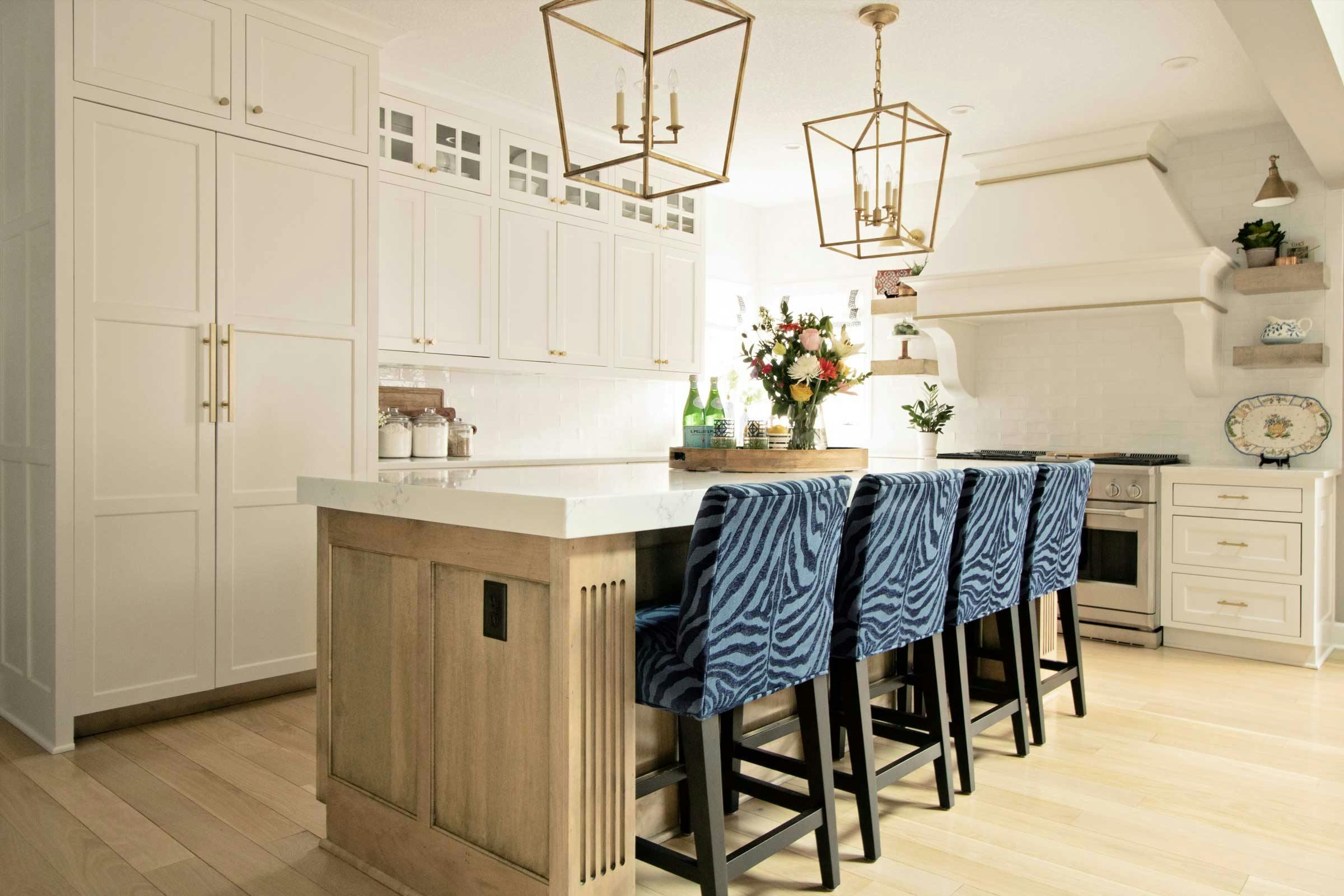 Kitchen with modern island designed by ML Designs